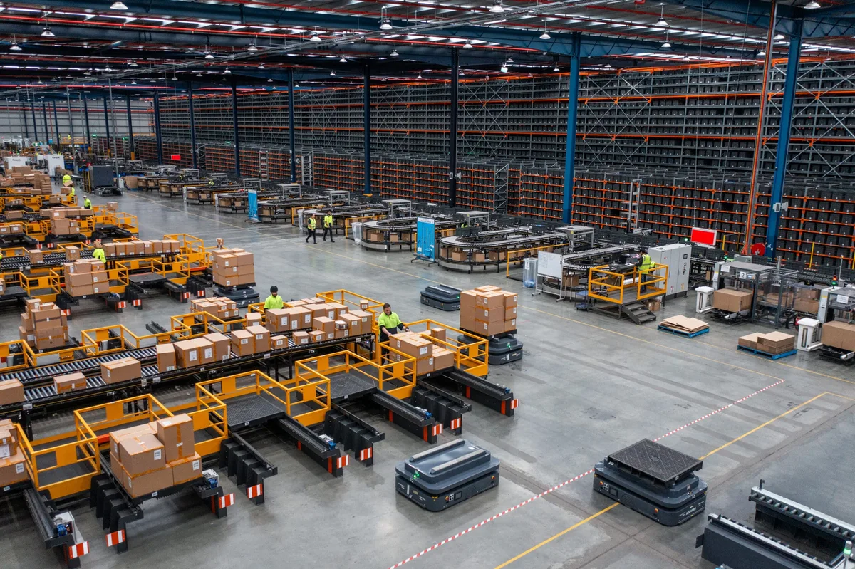 Modern industrial warehouse and production logistics area with automated equipment